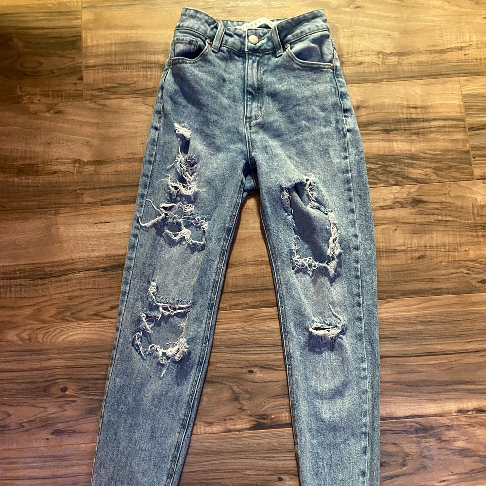 Ripped acid washed jeans